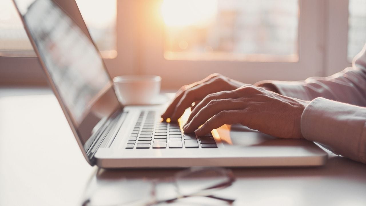 person using laptop